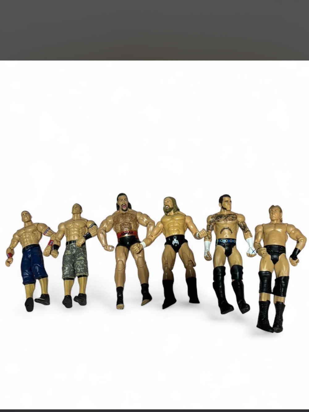 WWE Action Figure Lot with Black, Blue, Green & Red Accents